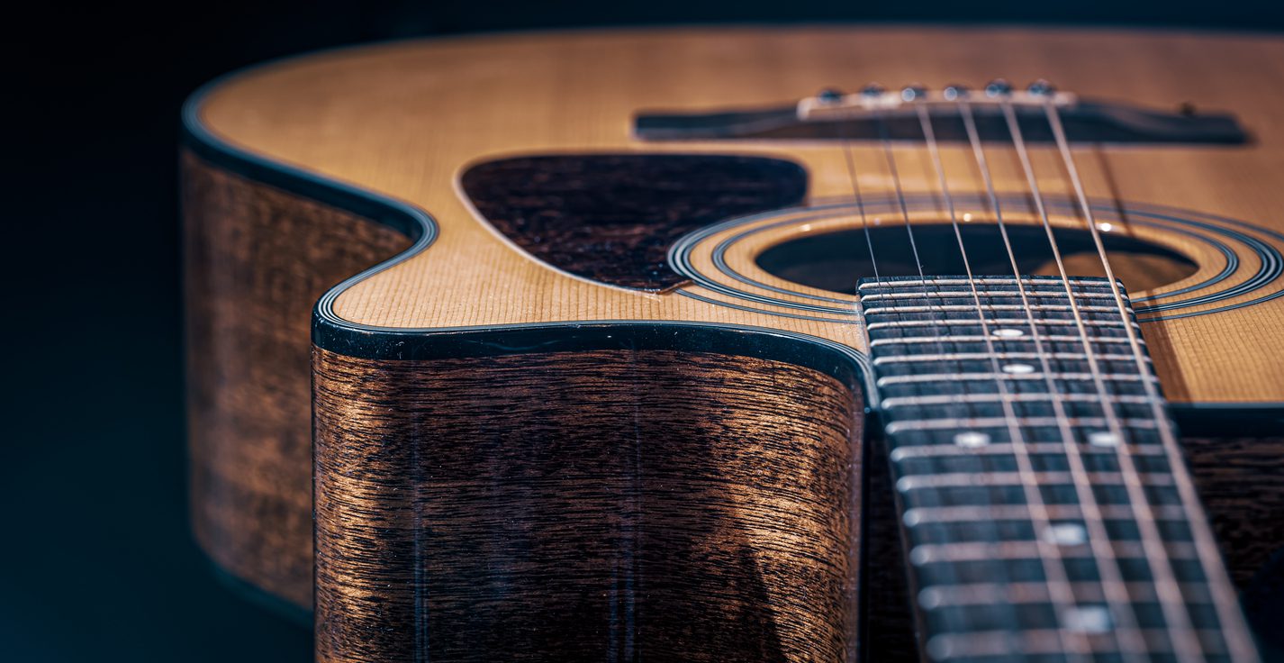 artistic photo of an acoustic guitar